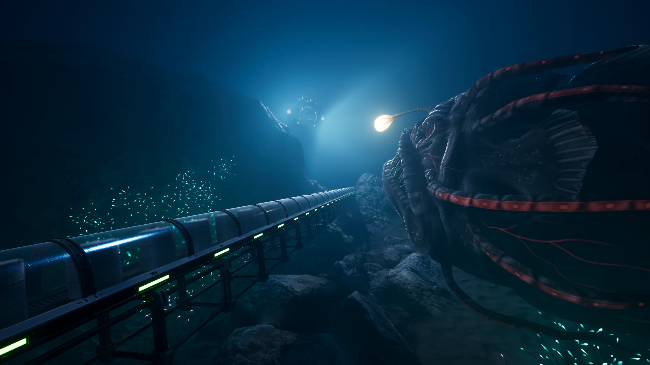 A huge luminous sea creature beside an underwater pipeline